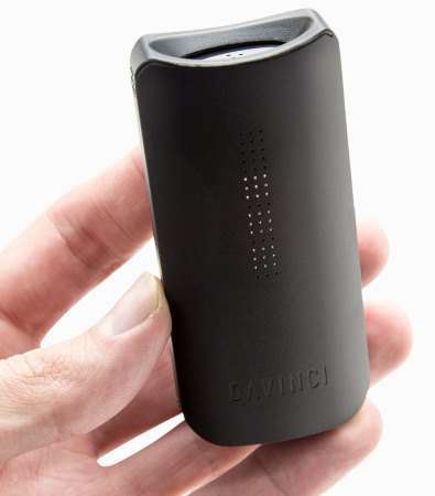 The size of the Davinci IQ vaporizer in a hand