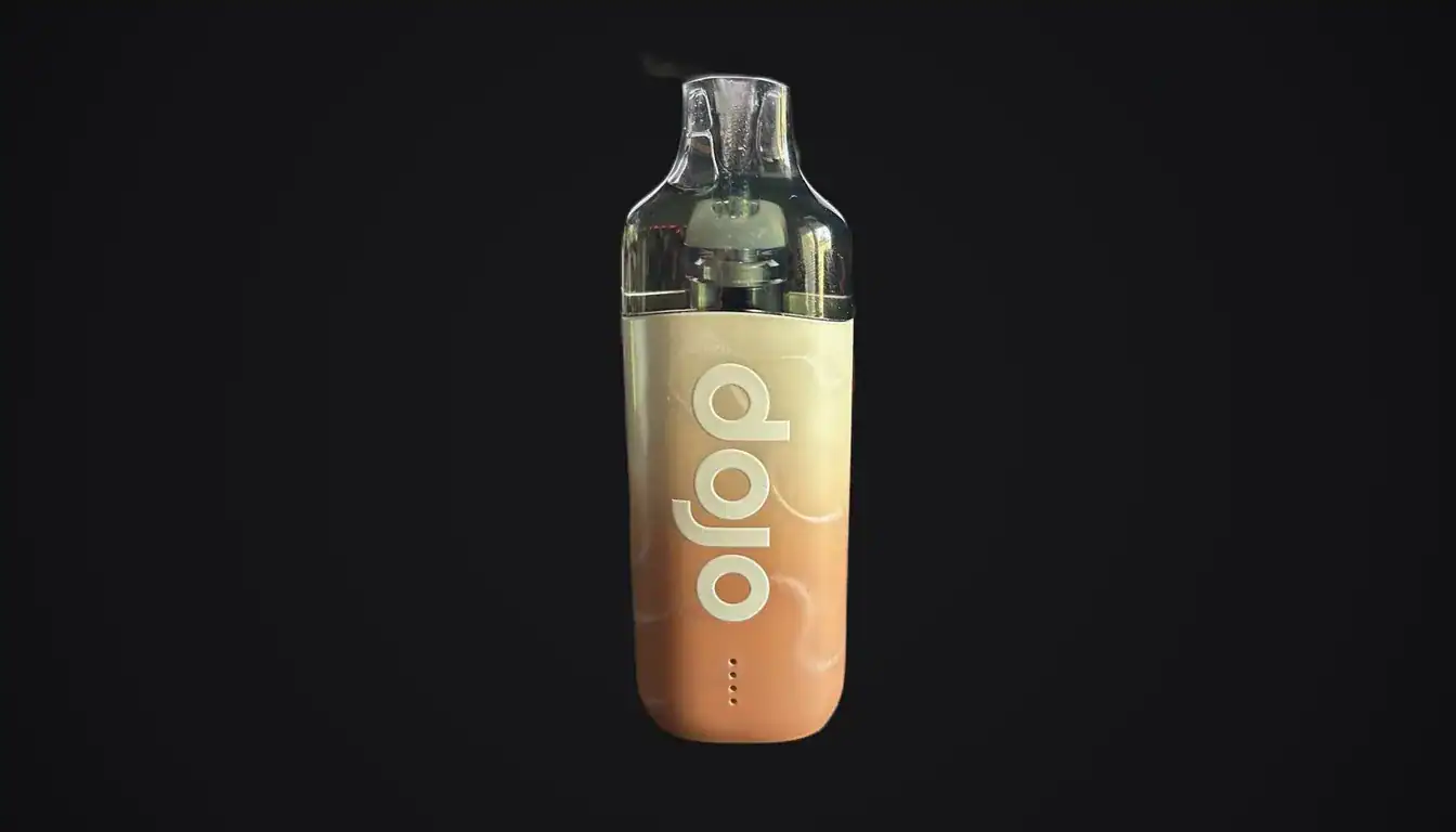 Dojo Blast 10K Fresh vape device with gradient peach-to-cream colored wrap against black background