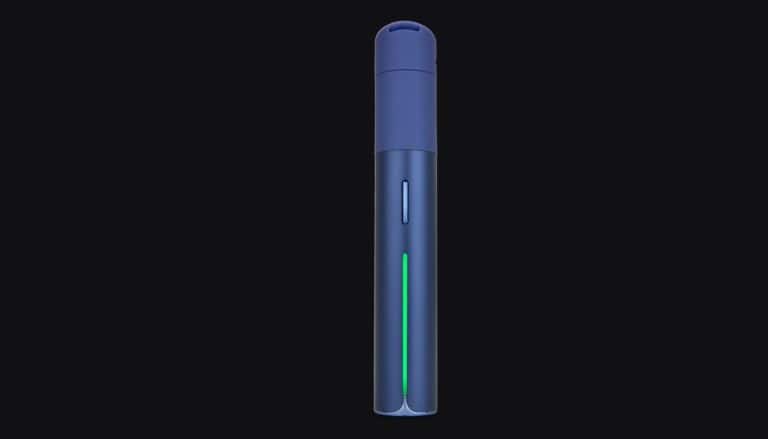 Puffco Pivot blue vape device standing upright against black background with green light indicator