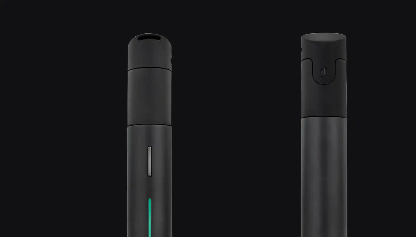 Puffco Pivot vape device shown in two black units against dark background with green indicator light